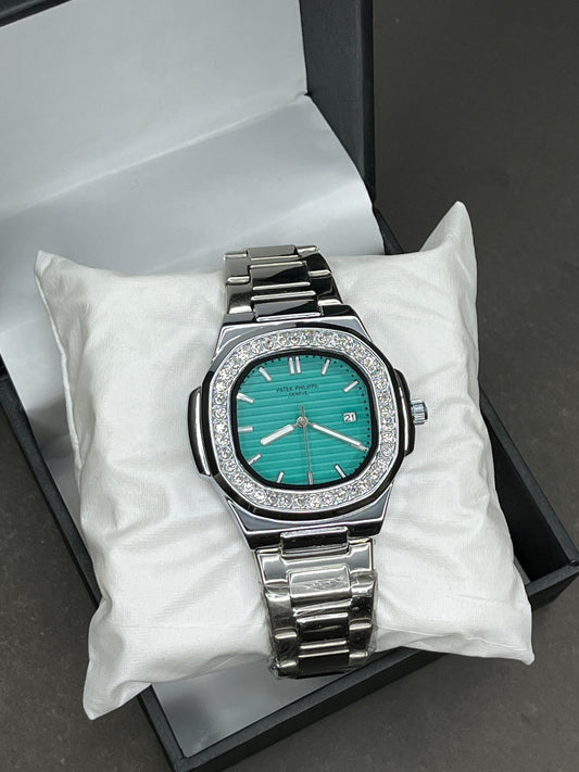 Patek Philippe - Date | Turquoise Dial with Diamond Bezel | Silver Chain