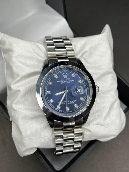Rolex (Oyster Perpetual) - Date | Blue Dial | Silver chain